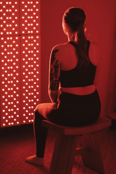 Woman receiving a red light therapy treatment